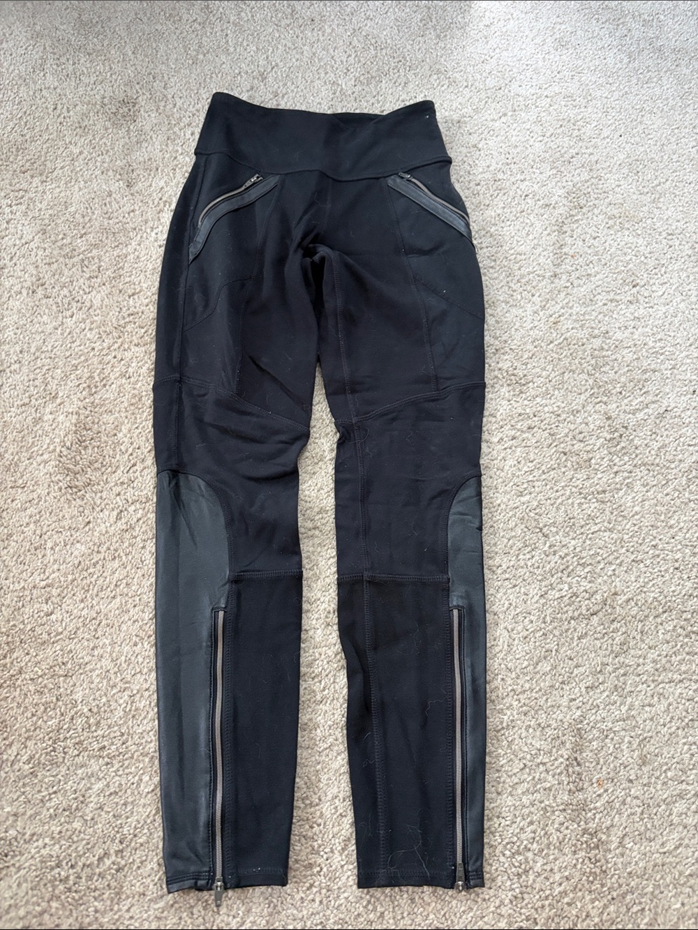 Athleta Black High-Waist Zip Pocket Leggings with Ankle Zips